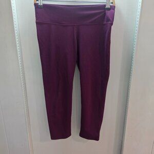 Fabletics PureLuxe Mid-Rise Capri Leggings plum/burgundy Size M